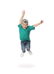 Photo of Happy little boy dancing on white background