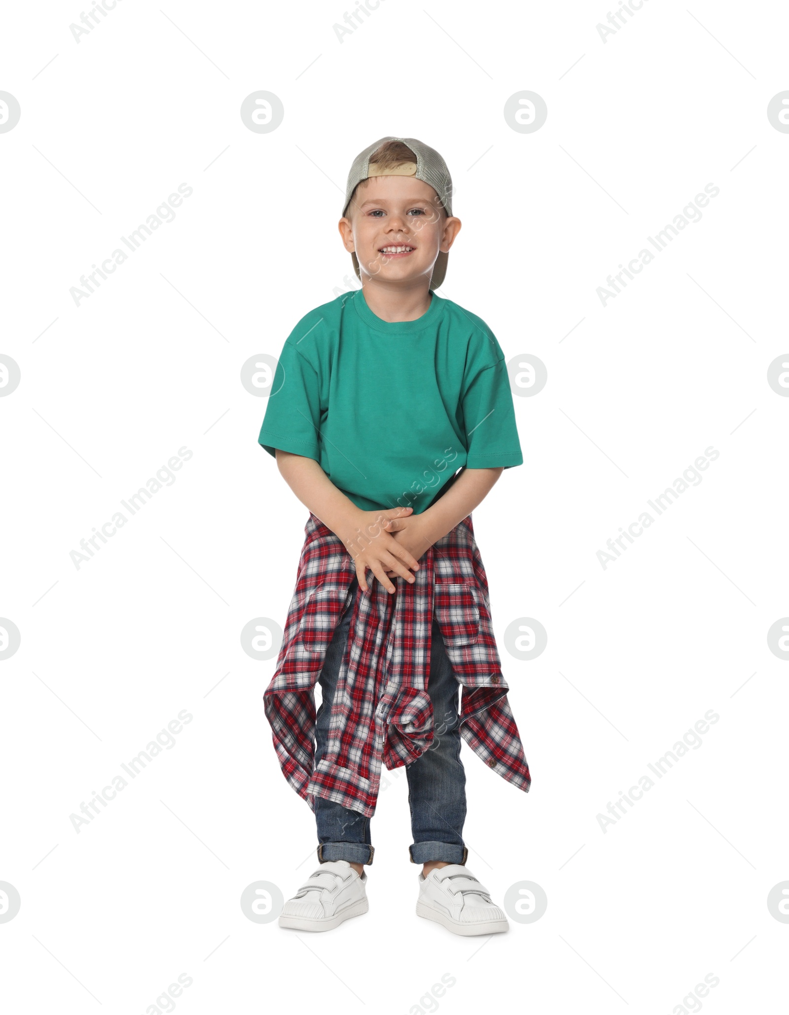 Happy little boy dancing on white background Photo of Happy little boy dancing on white background