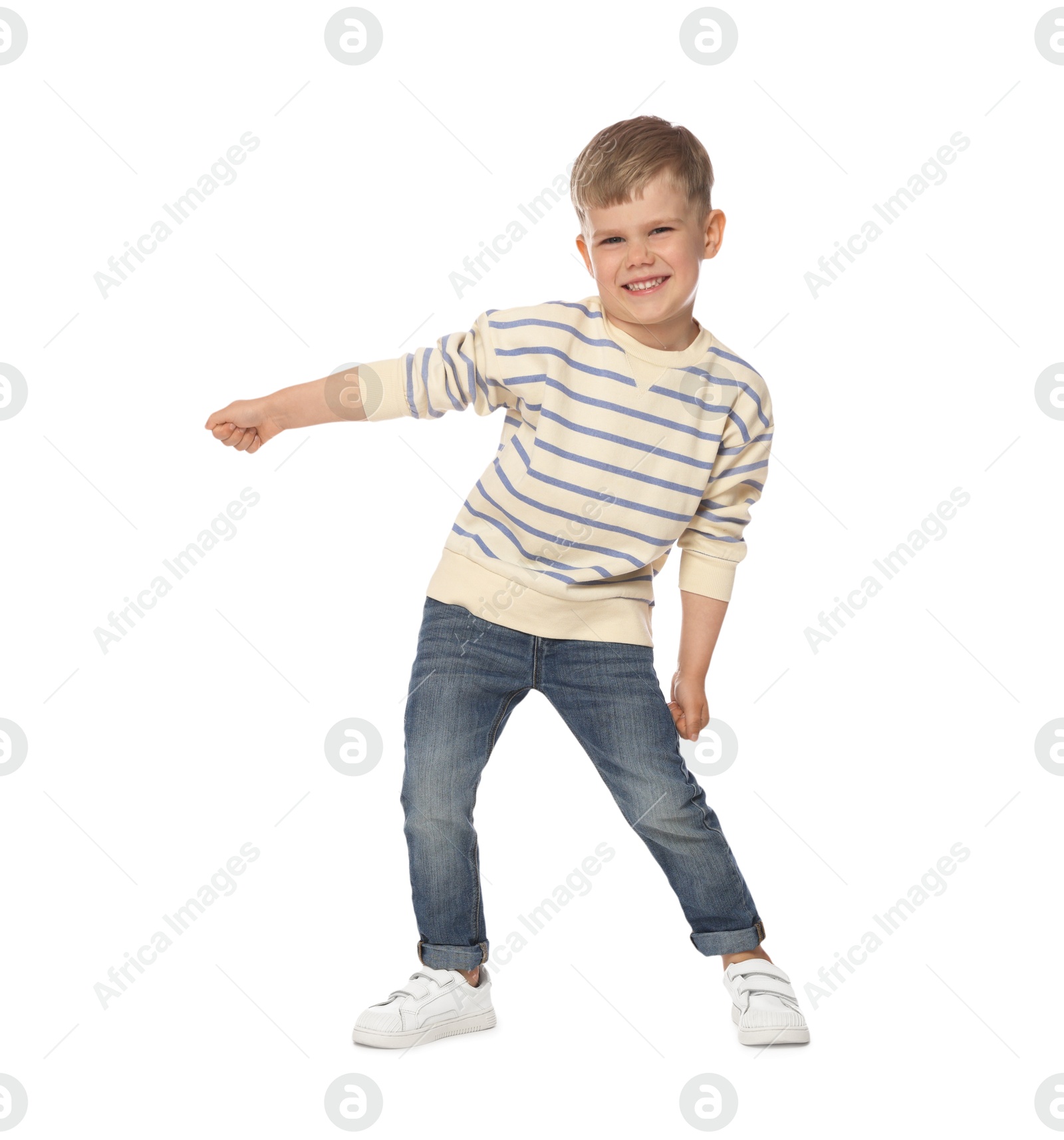 Photo of Happy little boy dancing on white background