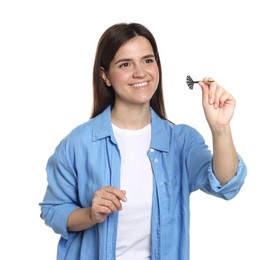 Photo of Targeting. Smiling woman with dart aiming on white background
