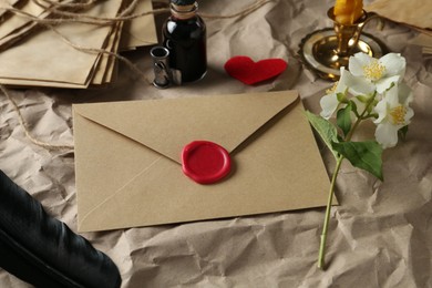 Photo of Composition with love letters and flowers on table