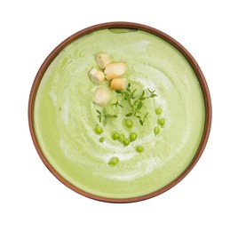 Photo of Tasty pea cream soup with croutons and thyme isolated on white, top view