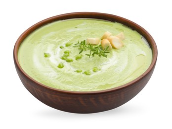 Photo of Tasty pea cream soup with croutons and thyme isolated on white
