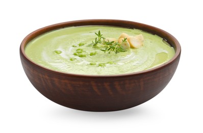 Photo of Tasty pea cream soup with croutons and thyme isolated on white