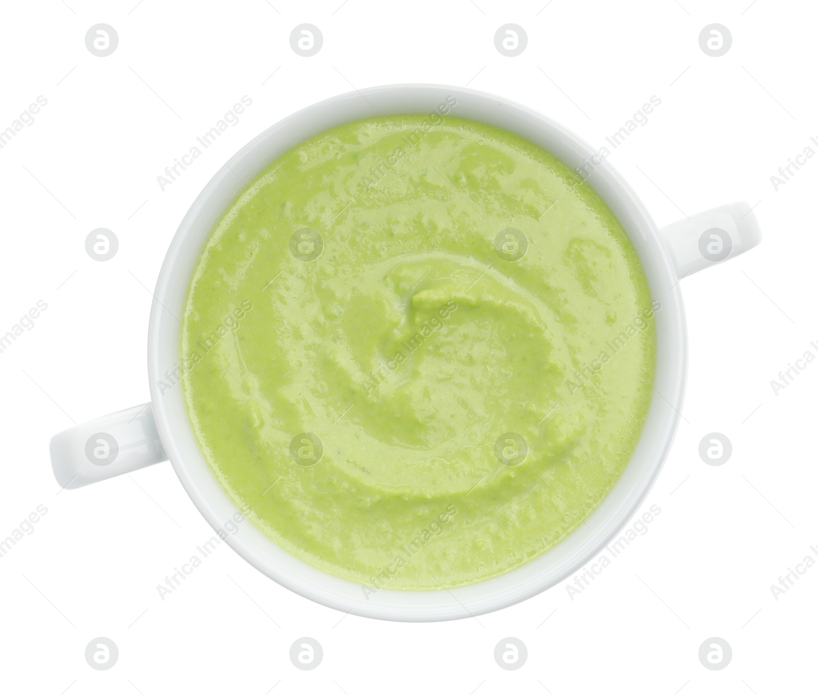 Photo of Tasty pea cream soup isolated on white, top view