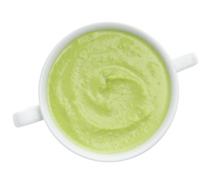 Photo of Tasty pea cream soup isolated on white, top view
