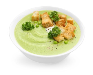 Photo of Tasty pea cream soup with croutons and broccoli isolated on white