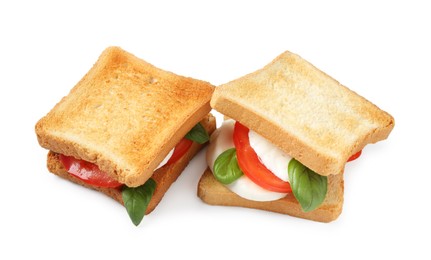 Photo of Tasty sandwiches with mozzarella cheese, tomatoes and basil on white background, above view