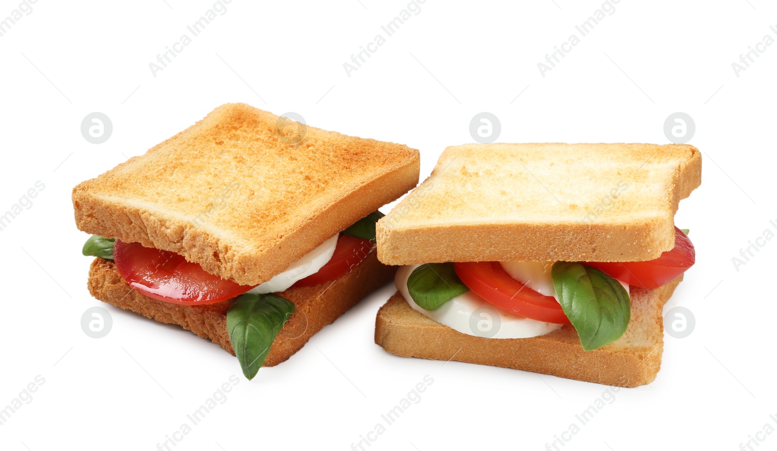 Tasty sandwiches with mozzarella cheese, tomatoes and basil on white background Photo of Tasty sandwiches with mozzarella cheese, tomatoes and basil on white background
