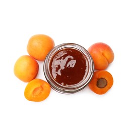 Photo of Sweet jam in jar and apricots isolated on white