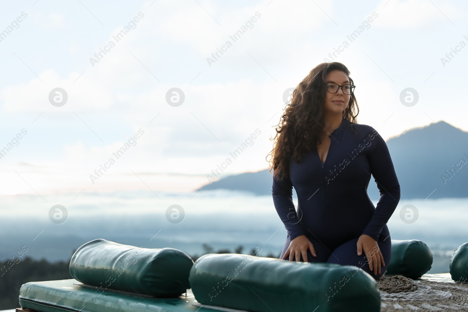 Beautiful woman enjoying picturesque view of mountains. Space for text Photo of Beautiful woman enjoying picturesque view of mountains. Space for text
