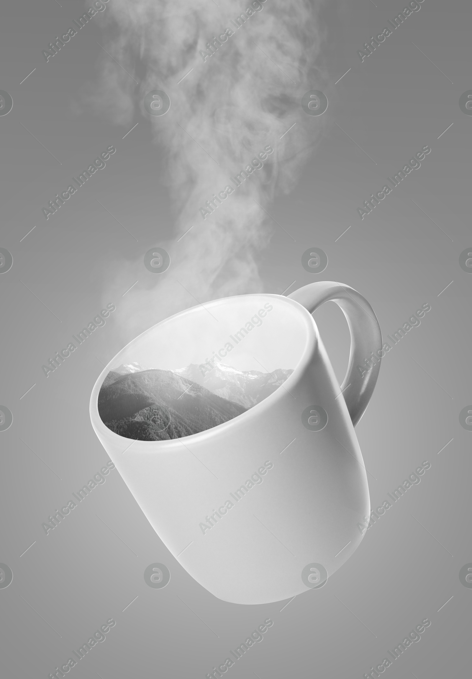 Mountain landscape in cup on grey gradient background. Steam rising out of cup Image of Mountain landscape in cup on grey gradient background. Steam rising out of cup