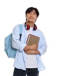 Photo of Student with headphones, books and backpack on white background