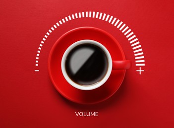 Image of Coffee and volume of energy gauge scale on red background, top view. Handle of cup pointing at maximum. Stimulating property of caffeine