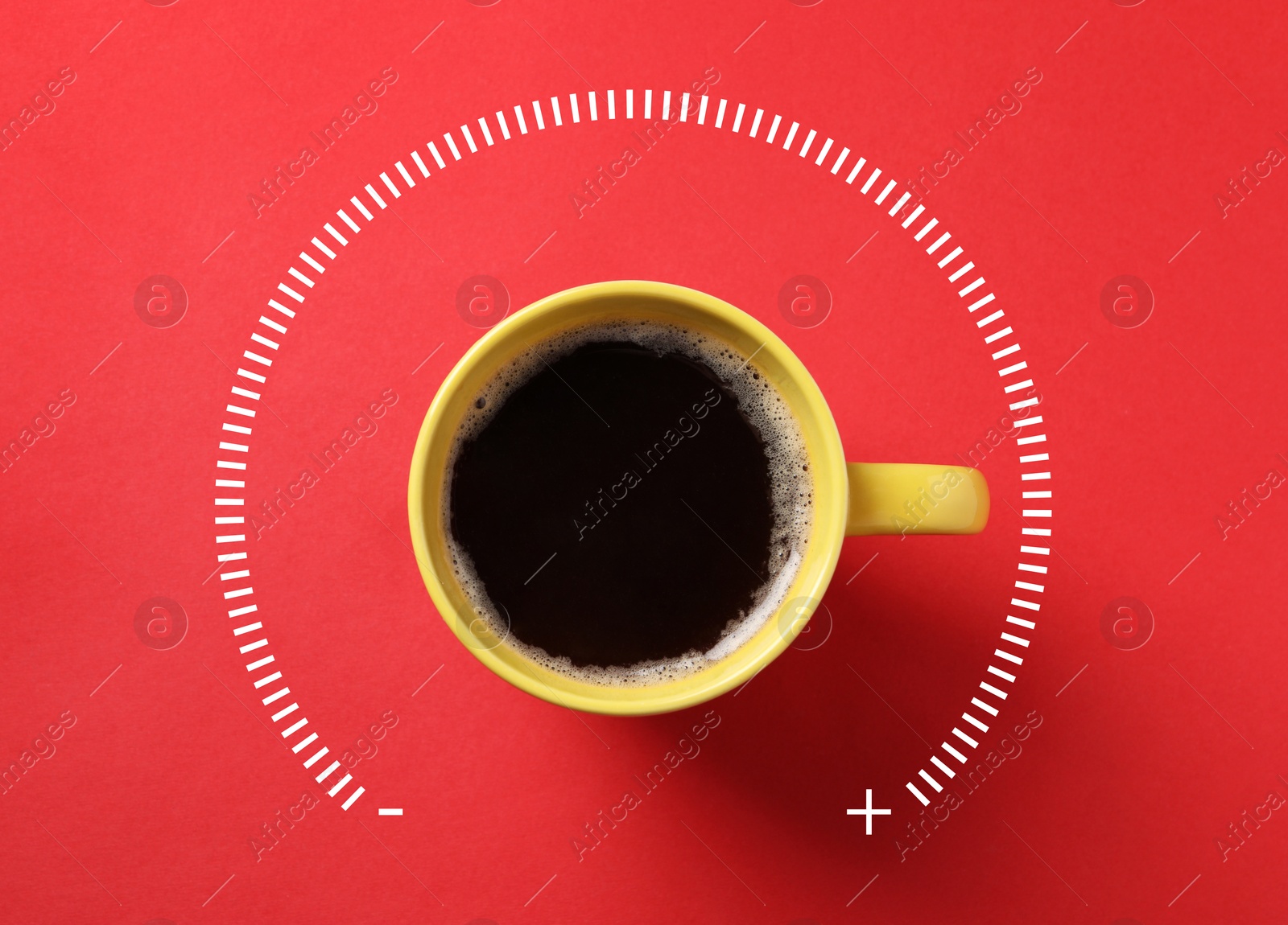 Coffee and power gauge scale on red background, top view. Handle of cup pointing at maximum area. Energizing property of caffeine Image of Coffee and power gauge scale on red background, top view. Handle of cup pointing at maximum area. Energizing property of caffeine