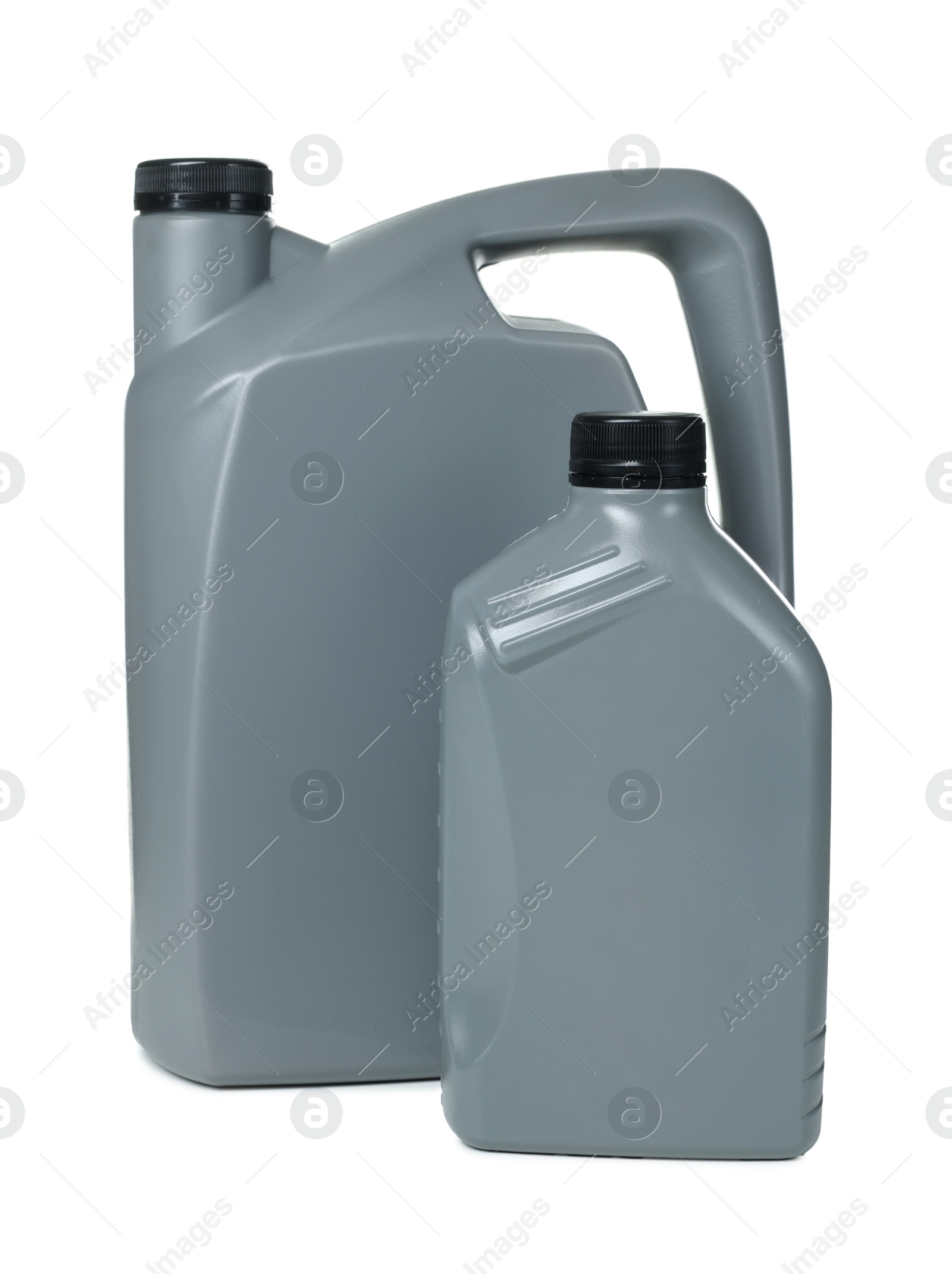 Photo of Motor oil in plastic canisters isolated on white