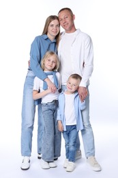 Photo of Full length portrait of happy family on white background