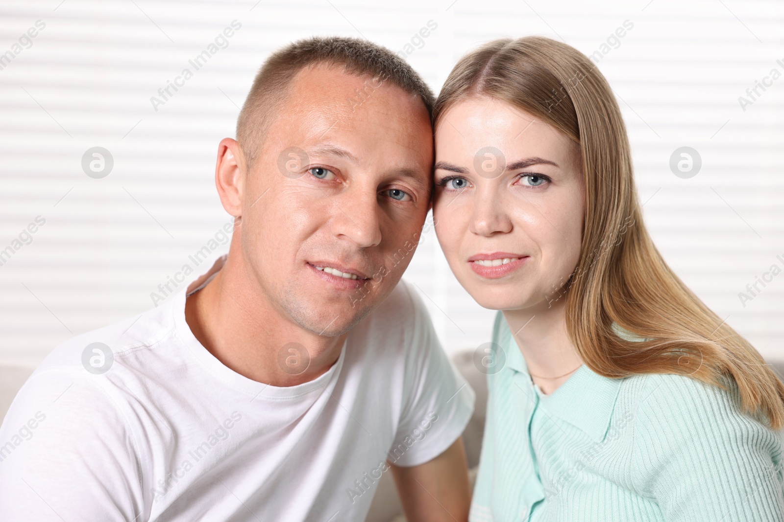 Portrait of happy lovely couple at home Photo of Portrait of happy lovely couple at home