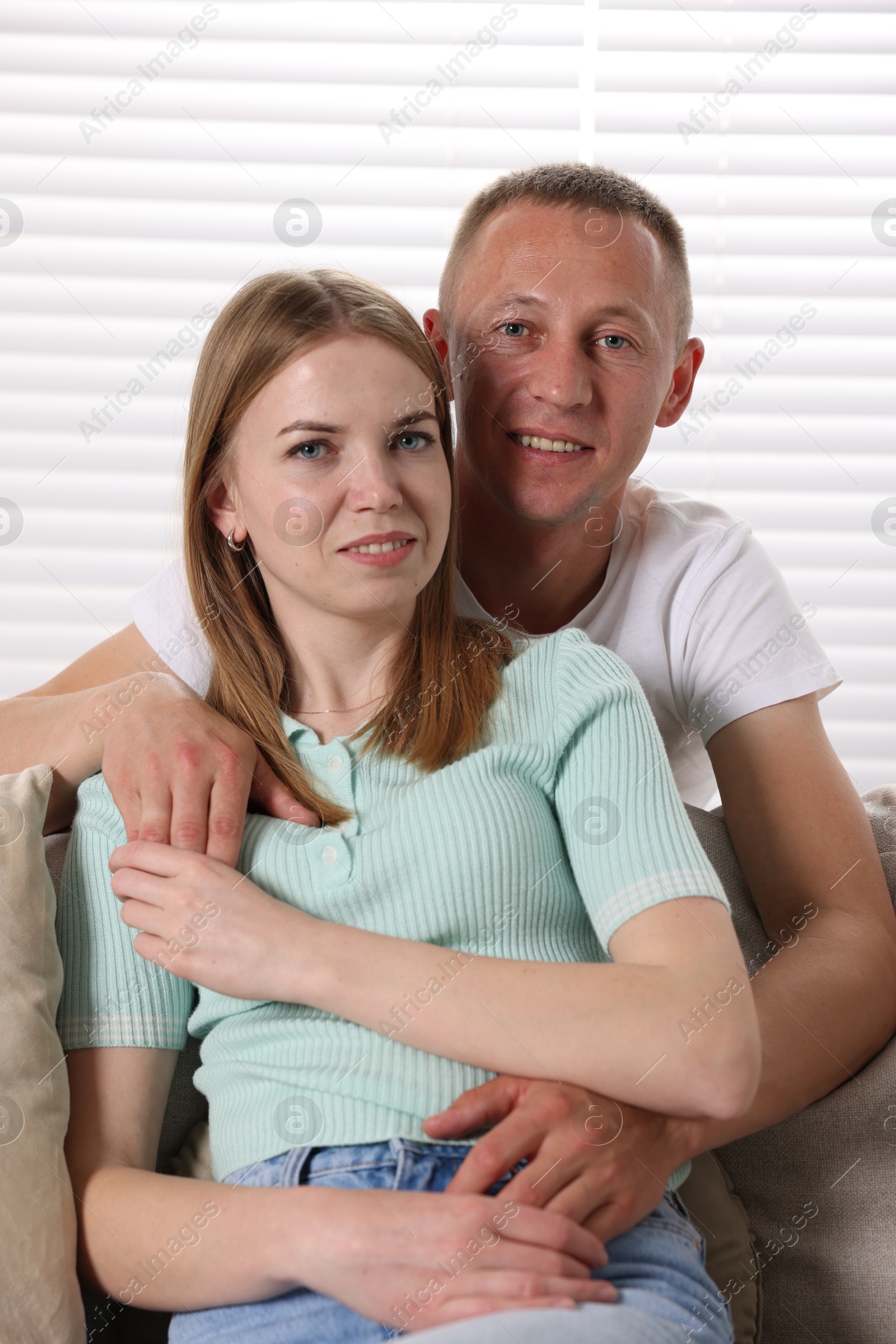 Portrait of happy lovely couple at home Photo of Portrait of happy lovely couple at home