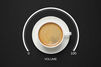 Image of Coffee and volume of energy gauge scale on black background, top view. Handle of cup pointing at maximum area. Stimulating property of caffeine