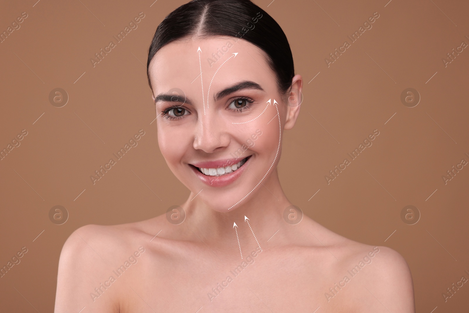 Beautiful woman with perfect skin after collagen treatment on brown background. Arrows on her face illustrating lifting and smoothing effect Image of Beautiful woman with perfect skin after collagen treatment on brown background. Arrows on her face illustrating lifting and smoothing effect