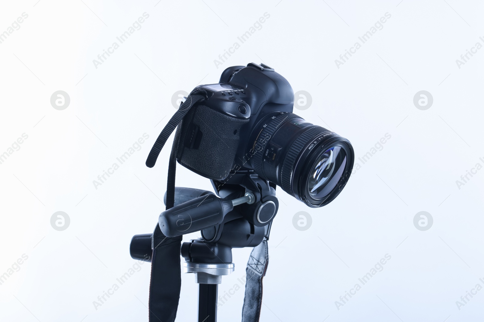 Modern professional video camera on white background Photo of Modern professional video camera on white background
