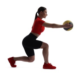 Photo of Athletic woman exercising with medicine ball on white background