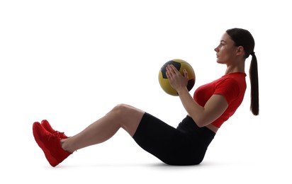 Photo of Athletic woman exercising with medicine ball on white background