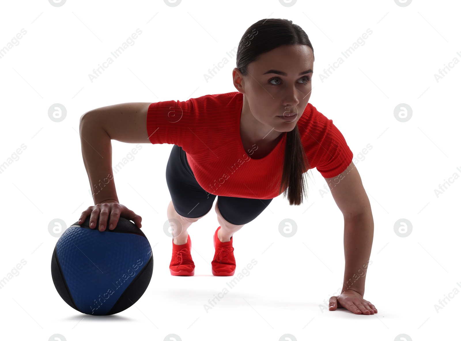 Athletic woman exercising with medicine ball on white background Photo of Athletic woman exercising with medicine ball on white background