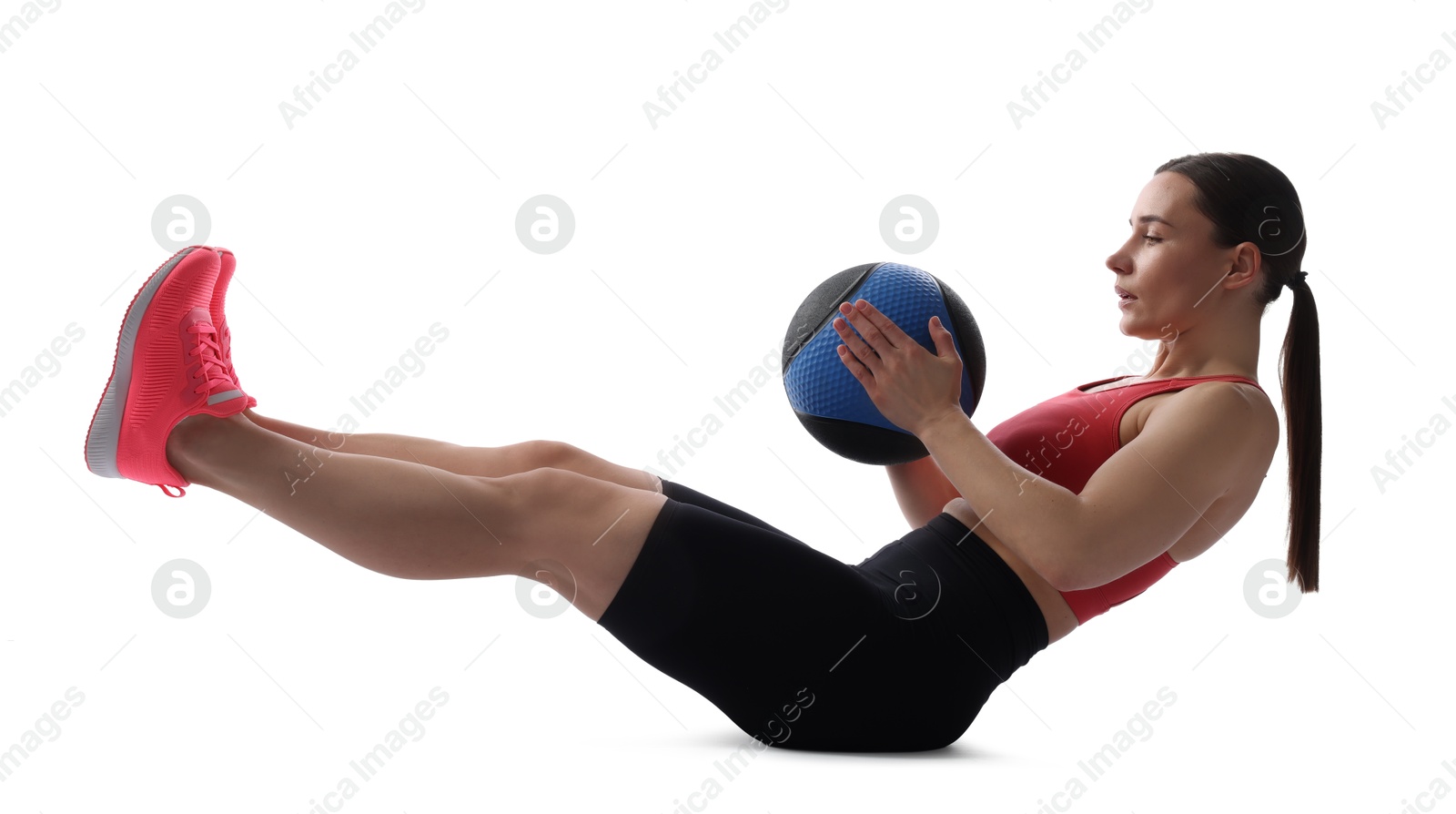 Athletic woman exercising with medicine ball on white background Photo of Athletic woman exercising with medicine ball on white background