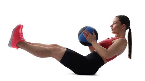 Photo of Athletic woman exercising with medicine ball on white background