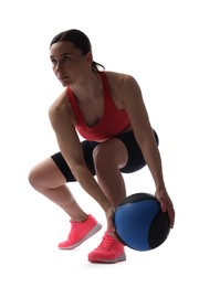 Photo of Athletic woman exercising with medicine ball on white background