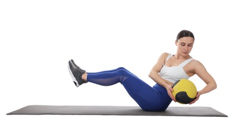 Photo of Athletic woman exercising with medicine ball on white background