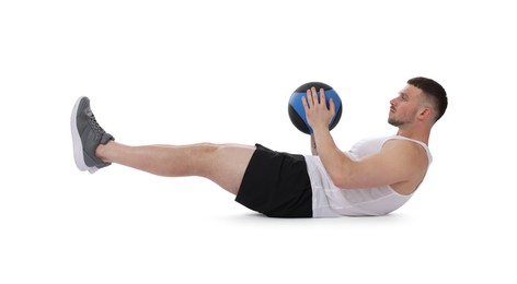 Photo of Man exercising with medicine ball on white background