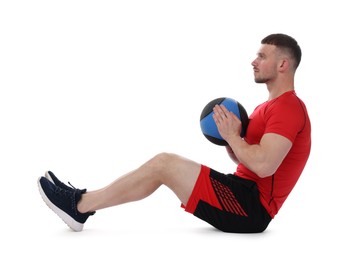 Photo of Man exercising with medicine ball on white background