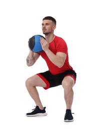 Photo of Man exercising with medicine ball on white background