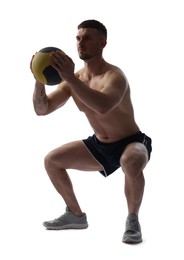 Photo of Man exercising with medicine ball on white background
