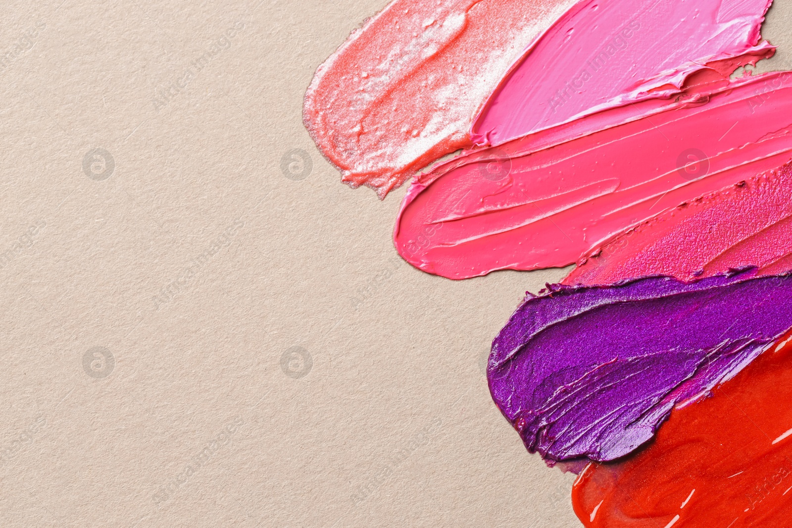 Different cosmetic products on light background, flat lay. Space for text Photo of Different cosmetic products on light background, flat lay. Space for text