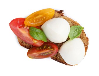 Photo of Tasty sandwich with mozzarella cheese, tomatoes and basil isolated on white, top view