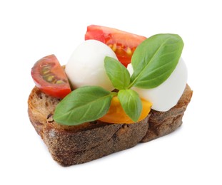 Photo of Tasty sandwich with mozzarella cheese, tomatoes and basil isolated on white