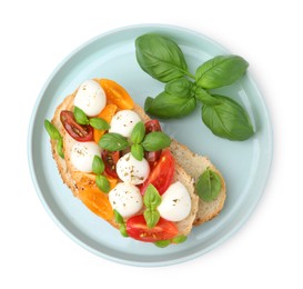 Photo of Tasty sandwich with mozzarella cheese, tomatoes and basil isolated on white, top view