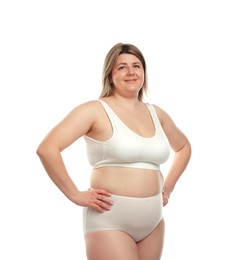 Photo of Weight loss. Plus size woman in underwear on white background