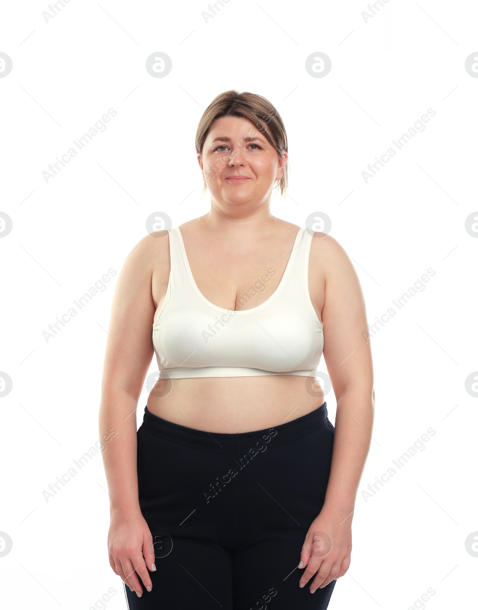 Weight loss. Plus size woman on white background Photo of Weight loss. Plus size woman on white background