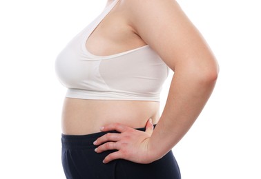 Photo of Weight loss. Plus size woman in underwear on white background, closeup