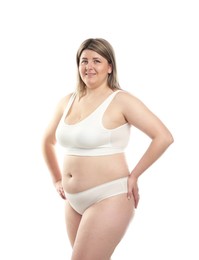 Photo of Weight loss. Plus size woman in underwear on white background
