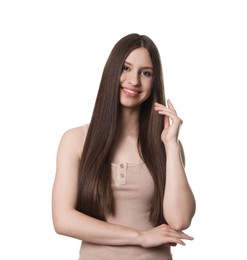 Photo of Portrait of smiling teenage girl with healthy long hair on white background