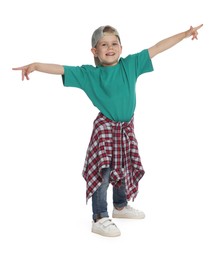 Photo of Happy little boy dancing on white background