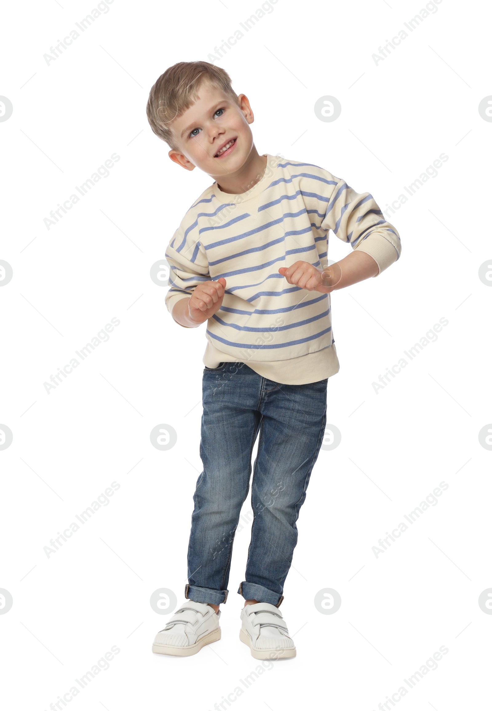 Happy little boy dancing on white background Photo of Happy little boy dancing on white background