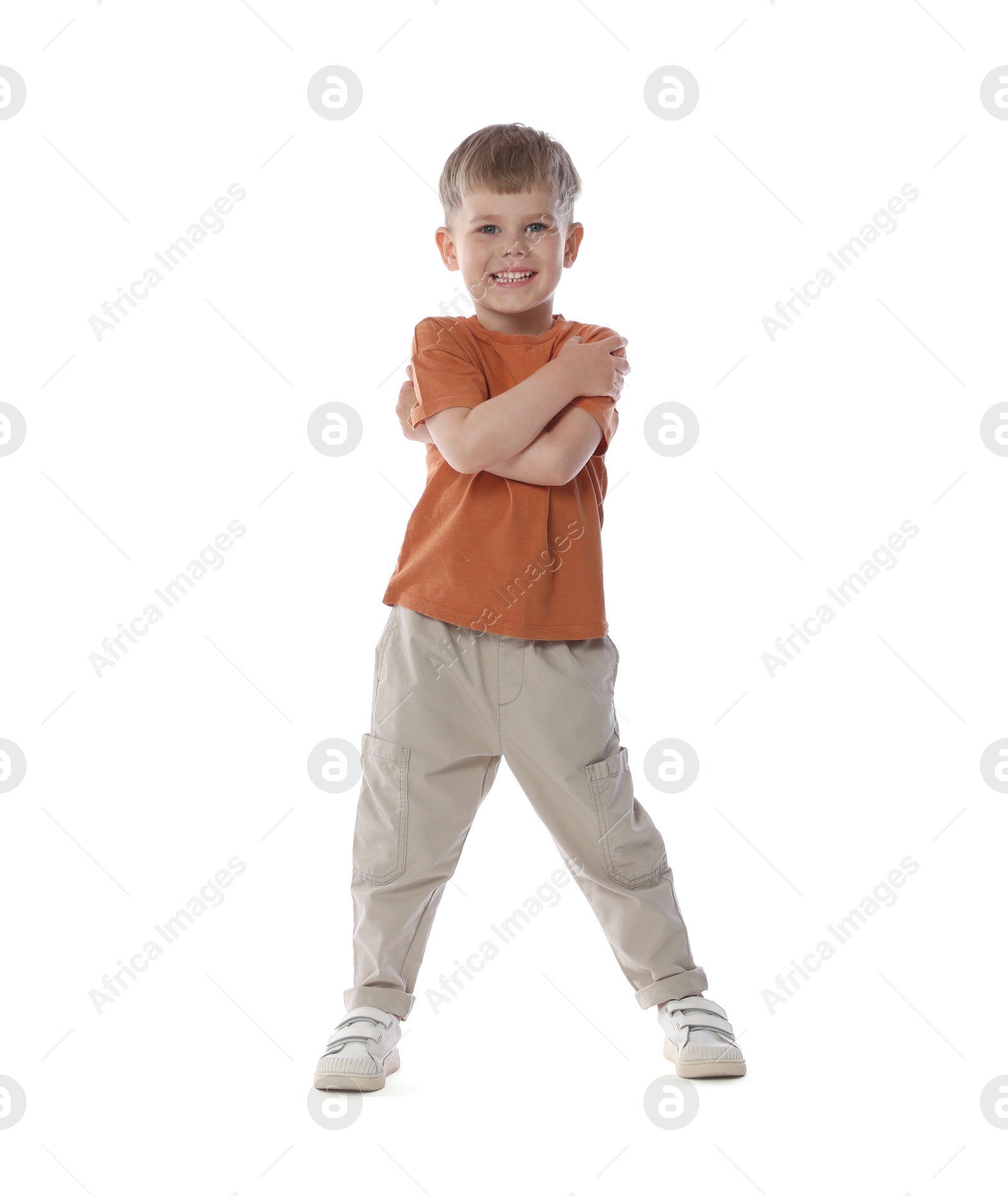 Happy little boy dancing on white background Photo of Happy little boy dancing on white background