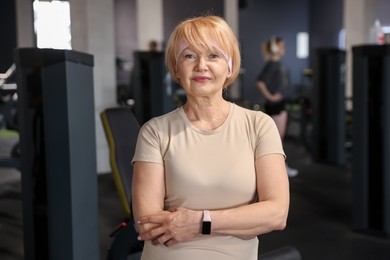 Photo of Portrait of beautiful senior woman in gym